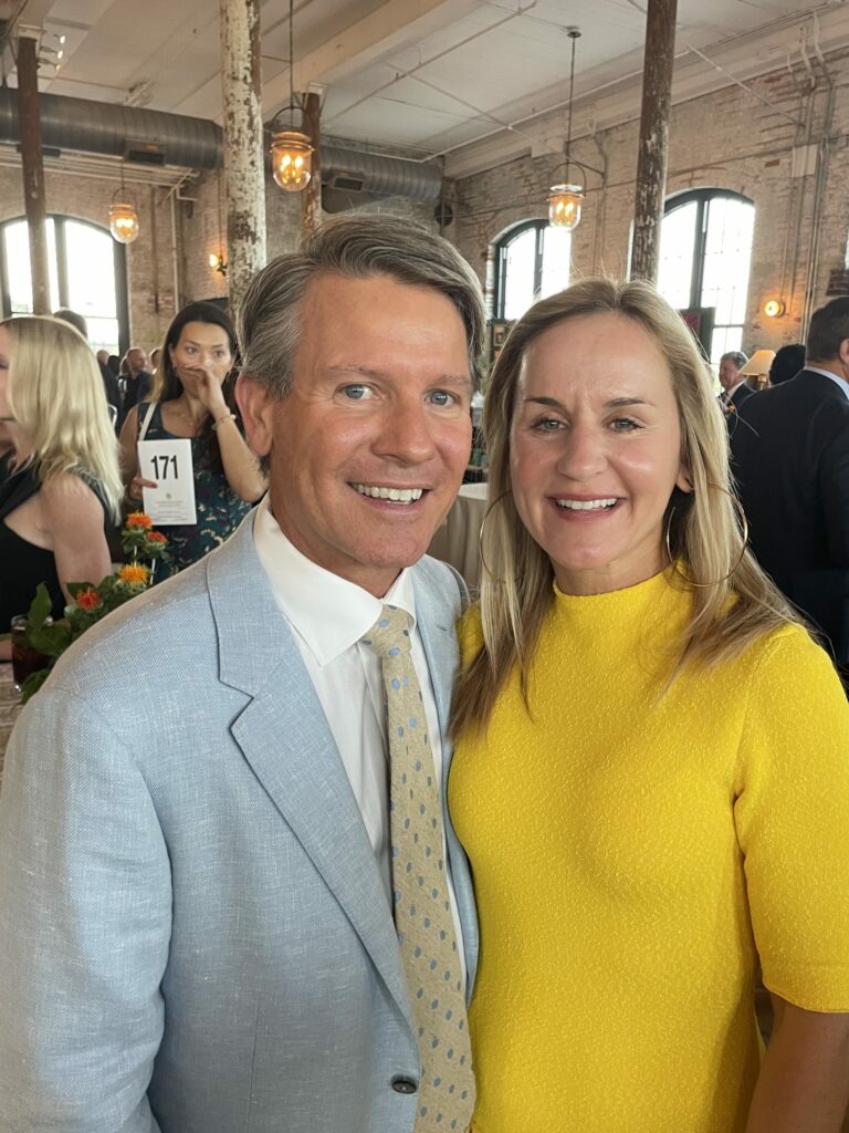 David Yarborough, founding partner of Yarborough Applegate, stands next to his wife, Jessica, at Dee Norton's 2022 Hope Grows Here dinner auction.