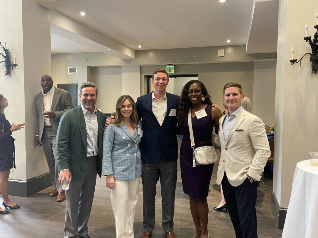 Yarborough Applegate attorneys David Lail, Alex Heaton, Perry Bucker, Megan M. Early-Soppa, and Liam Duffy stand together at SCAJ's Young Lawyers Seminar.
